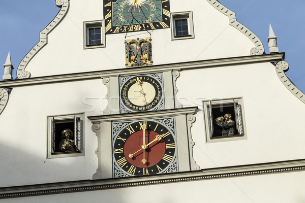 Peak Of A Building With A Clock Against A Blue Sky in Rothenburg Stock photo © meinzahn