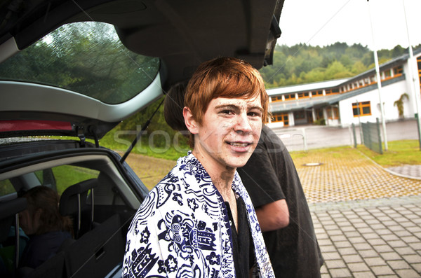 Stock photo: boy has dirt in his face from driving Quad