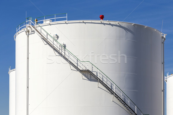 white tanks in tank farm with iron staircase   Stock photo © meinzahn