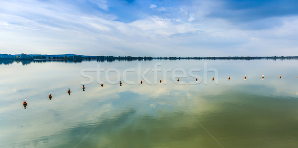 weir at altmuehl lakewith scenic reflection Stock photo © meinzahn