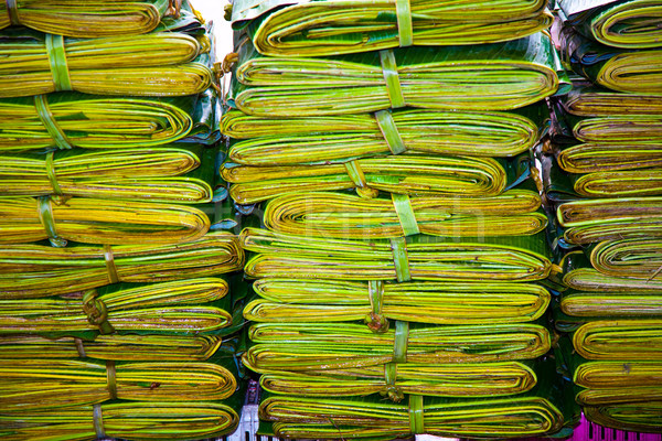 Stock photo: palm leaves on the flower herbs market, early morning in Bangkok