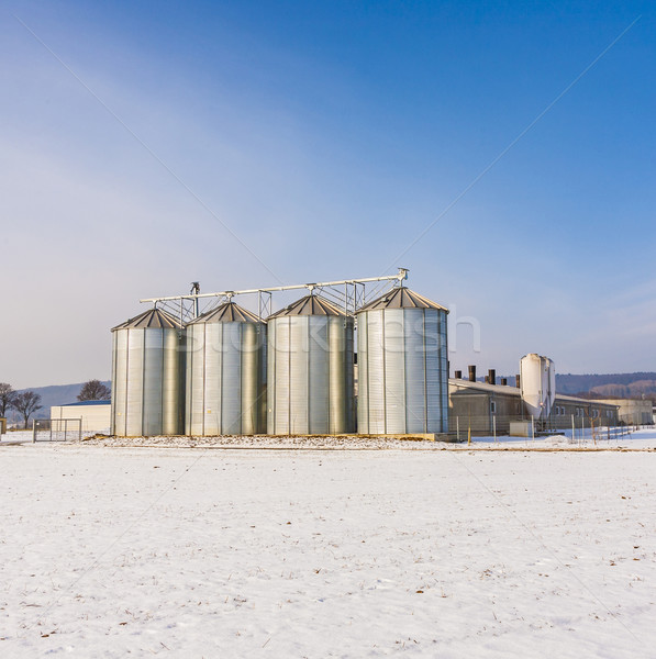 landscape with silo and snow white acre with blue sky Stock photo © meinzahn