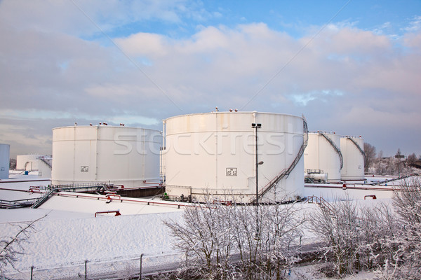 white tanks in tank farm with snow in winter Stock photo © meinzahn