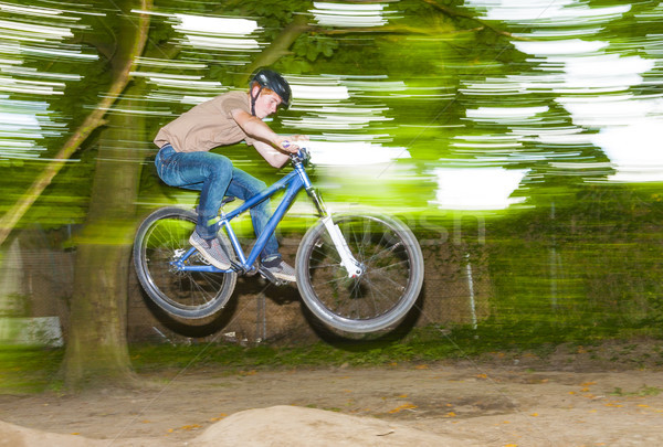 Gyermek jókedv ugrik bicikli rámpa nyitva Stock fotó © meinzahn