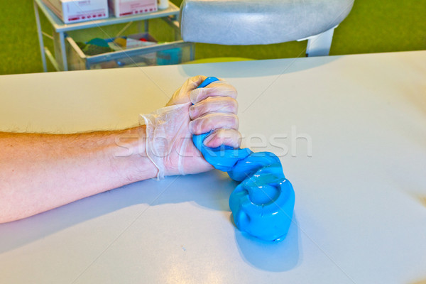 Mano fisioterapia dito rotto uomo medici Foto d'archivio © meinzahn