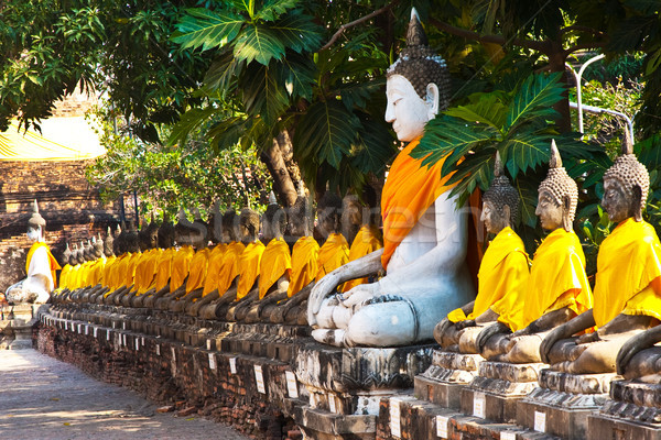 Buddha statues at the temple of Wat Yai Chai Mongkol in Ayutthay Stock photo © meinzahn
