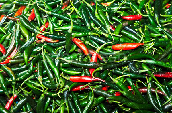 fresh chili pepper in different colors at the herb market in Ban Stock photo © meinzahn