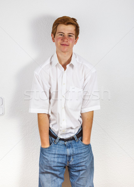 cool boy posing at a wall Stock photo © meinzahn