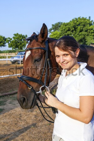 female rider hugging with her horse Stock photo © meinzahn