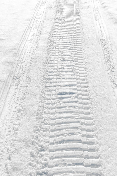 Trail of wheel in fresh snow Stock photo © meinzahn
