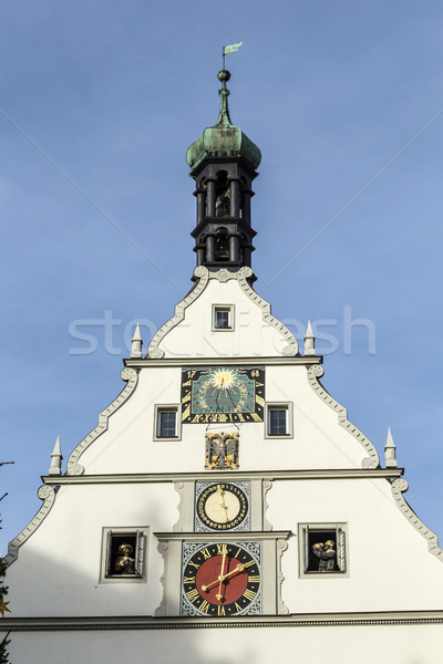 Peak Of A Building With A Clock Against A Blue Sky in Rothenburg Stock photo © meinzahn