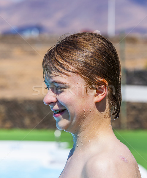 boy swimming in the pool Stock photo © meinzahn