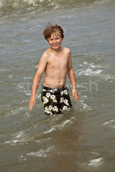 portrait of smart boy at the beach Stock photo © meinzahn