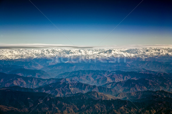 flying over the Himalaya in the morning with sunrise Stock photo © meinzahn