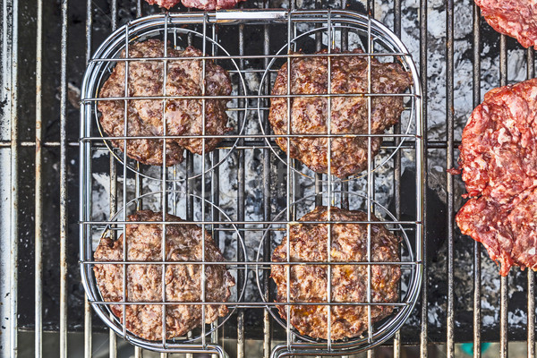   Burgers at the outdoor grill Stock photo © meinzahn