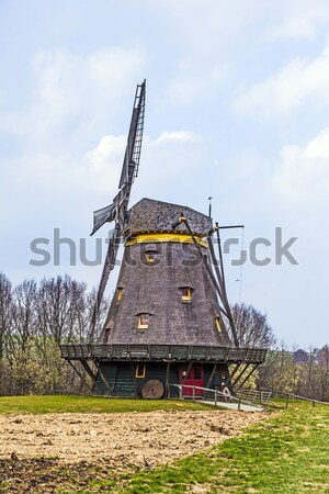 Oude wind molen wolken gebouw natuur Stockfoto © meinzahn