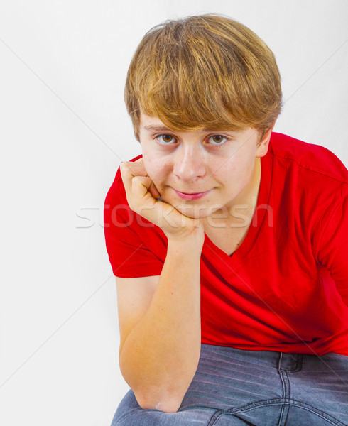 cool leisure young teenage boy with his head in his hands  Stock photo © meinzahn