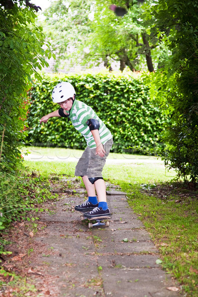 young boy on his skate board  Stock photo © meinzahn