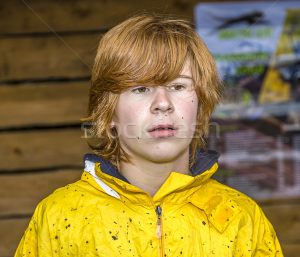 teenage boy with red hair looks astonished Stock photo © meinzahn