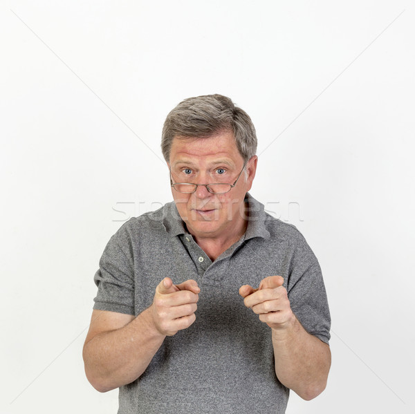 smiling mature man with grey polo shirt Stock photo © meinzahn