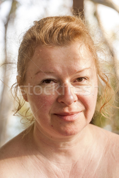 beautiful woman with red hair  Stock photo © meinzahn