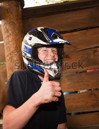 boy has dirt in his face from driving Quad Stock photo © meinzahn