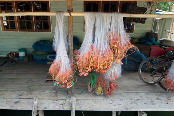 Fishing net will be dried in a small village  Stock photo © meinzahn