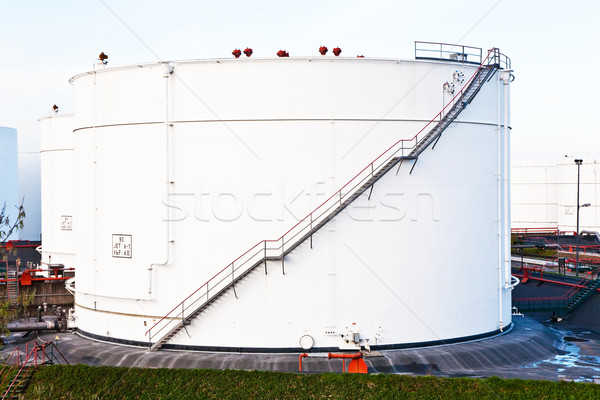 white tanks for petrol and oil in tank farm with blue sky Stock photo © meinzahn