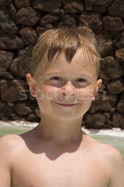 child is proudly and friendly looking with huge self confidence Stock photo © meinzahn