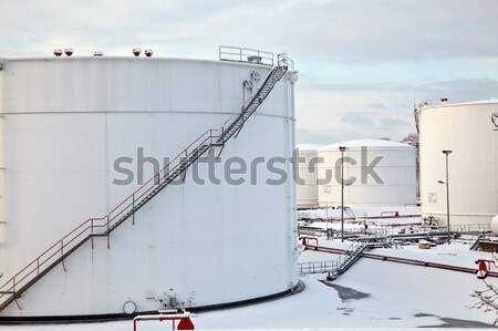 white tanks in tank farm with snow in winter Stock photo © meinzahn