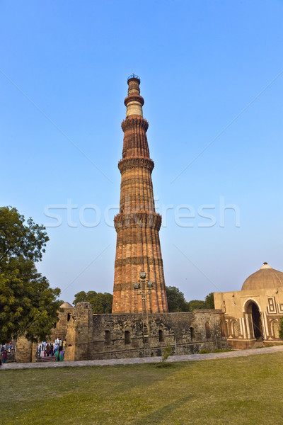 Delhi baksteen minaret gebouw stad zonsondergang Stockfoto © meinzahn