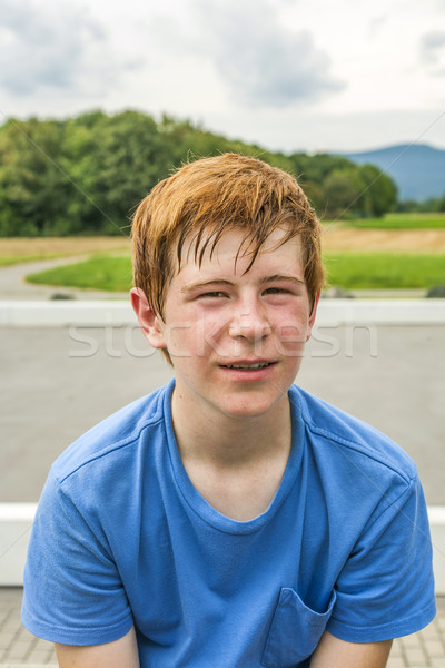 young sweating boy doing sports Stock photo © meinzahn
