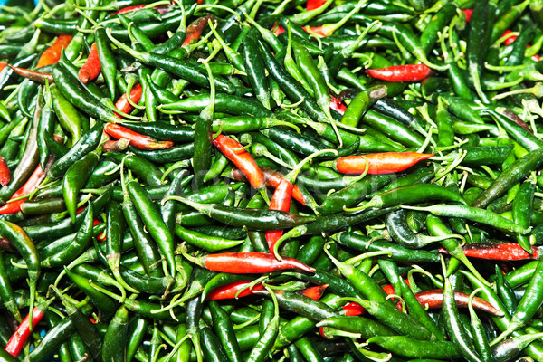 Frescos chile diferente colores hierba mercado Foto stock © meinzahn