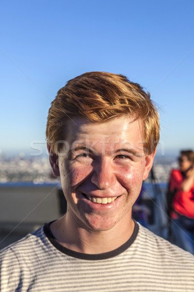 portrait of handsome boy with red hair under blue sky Stock photo © meinzahn