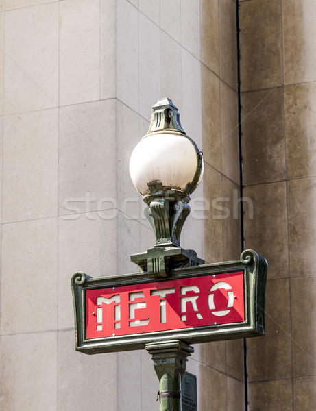 Parisian metro sign with a lamppost against  vintage wall Stock photo © meinzahn