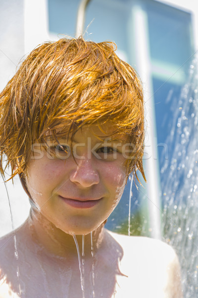 child has a refreshing shower in the heat Stock photo © meinzahn