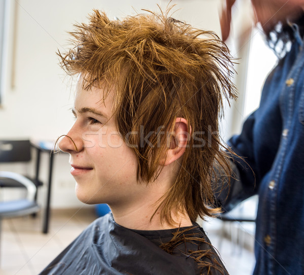 young boy with red hair at the hairdresser Stock photo © meinzahn