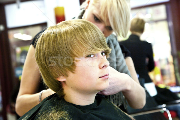 smiling young boy  at the hairdresser Stock photo © meinzahn