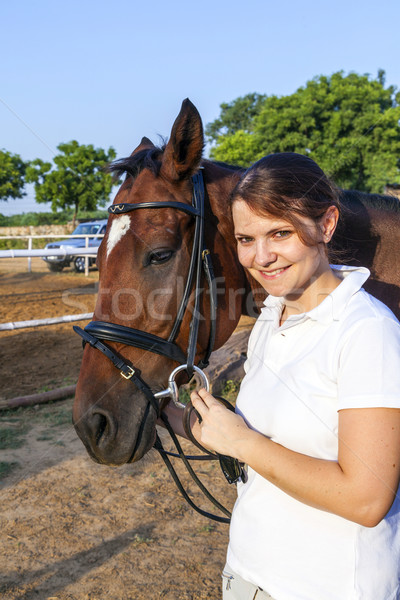 female rider hugging with her horse Stock photo © meinzahn