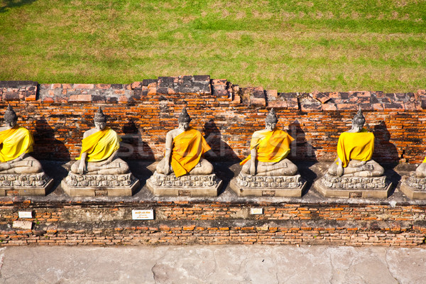 Buddha statues at the temple of Wat Yai Chai Mongkol Stock photo © meinzahn