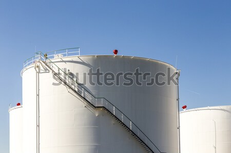 white tanks in tank farm with iron staircase  Stock photo © meinzahn