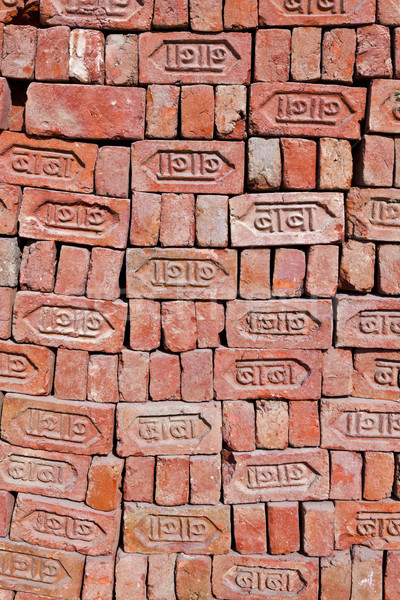 red stapled bricks give a harmonic pattern in the sun Stock photo © meinzahn