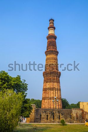Delhi ladrillo minarete edificio ciudad puesta de sol Foto stock © meinzahn