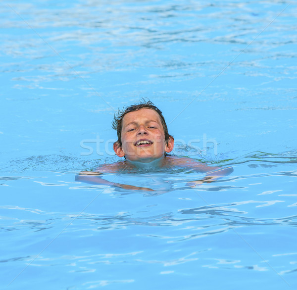 Ragazzo piscina cute acqua faccia felice Foto d'archivio © meinzahn
