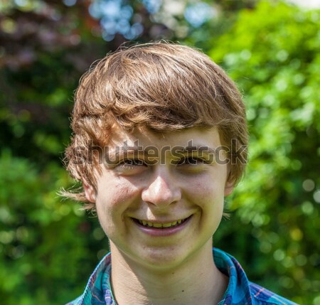 joung boy looking self confident with bamboo background Stock photo © meinzahn