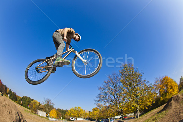 boy going airborne with a dirt  bike Stock photo © meinzahn