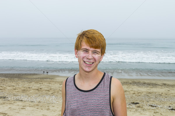 attractive young boy at the beach Stock photo © meinzahn