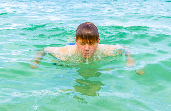 十幾歲的男孩 游泳的 海洋 海灘 太陽 海 商業照片 © meinzahn