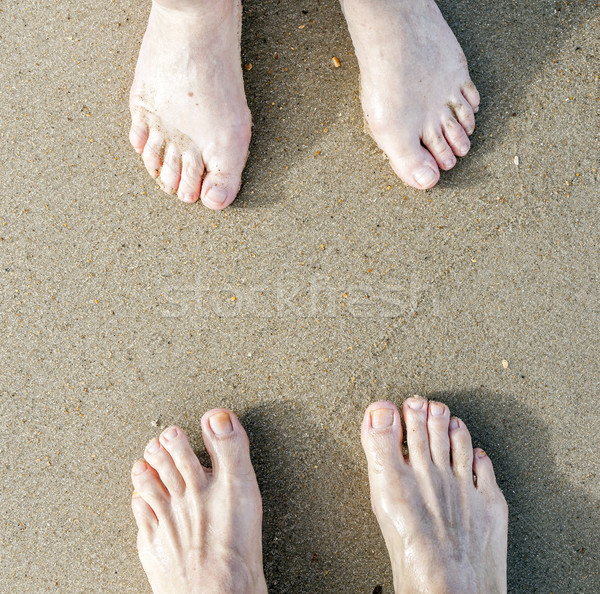 Pies Pareja playa playa de arena hombre feliz Foto stock © meinzahn
