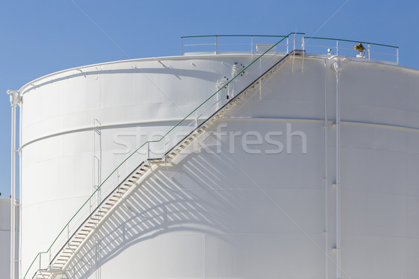 white tanks in tank farm with iron staircase   Stock photo © meinzahn